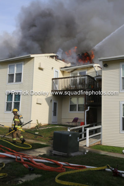 firefighters battle fire that destroyed multiple apartments