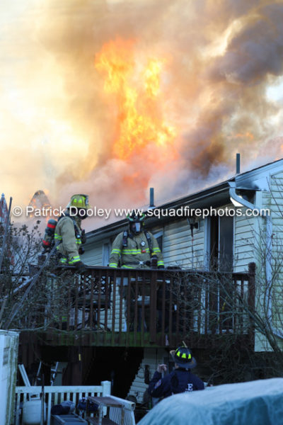 firefighters battle heavy smoke and flames from house fire in South Windsor CT