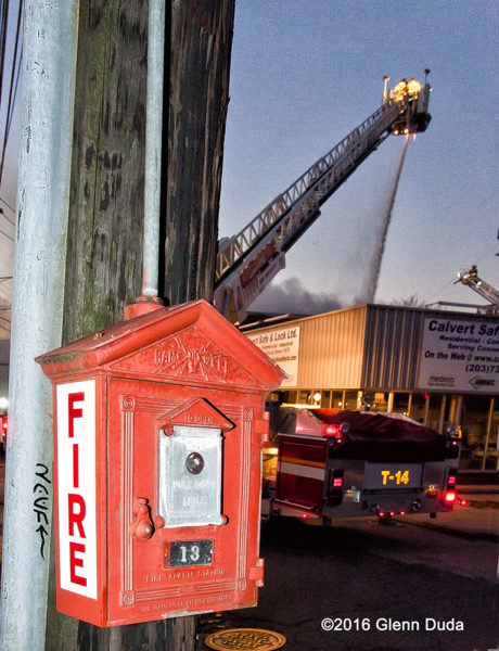 old fashioned fire alarm box near warehouse fire
