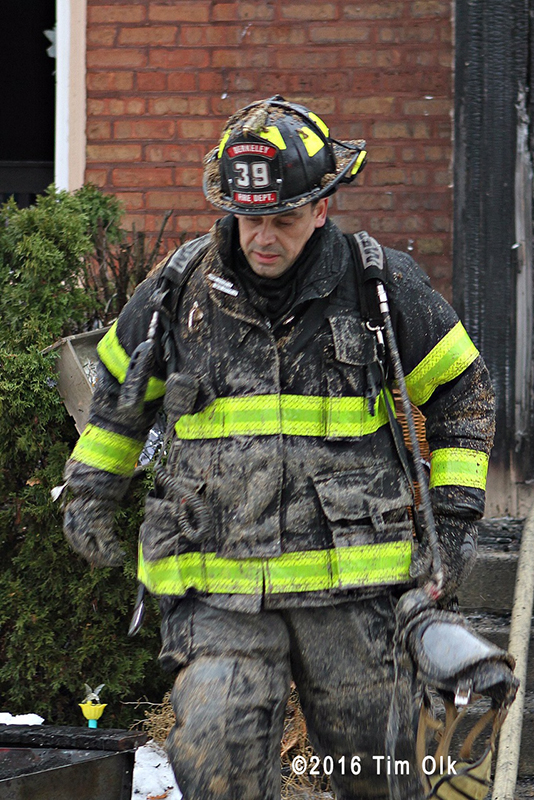 firefighter after battling a house fire