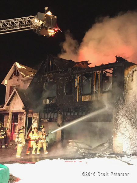 house fire scene at night