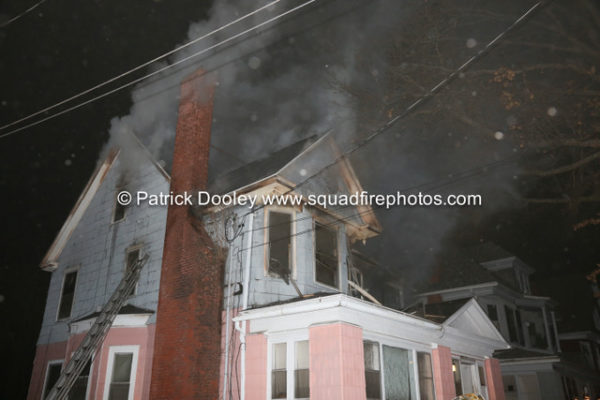 smoke from attic at house fire at night