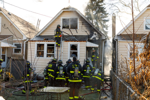 firefighters at house fire