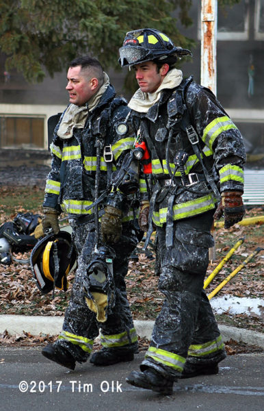 firefighters after battling fire on a cold day
