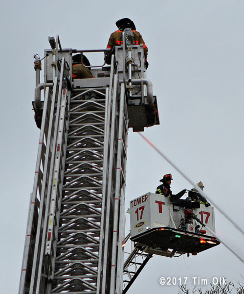 2 tower ladders with elevated master streams
