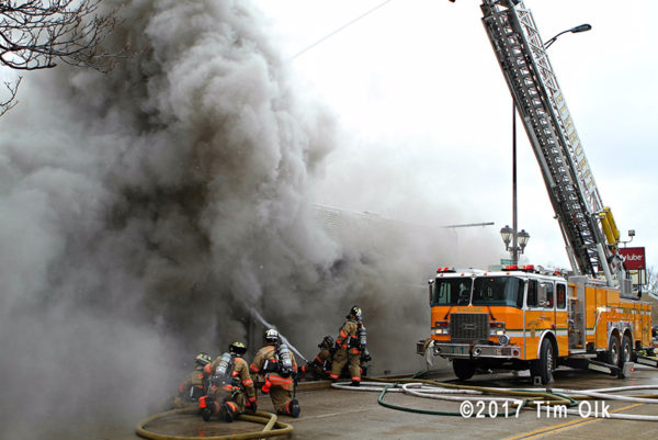 firefighters battle smokey fire in store