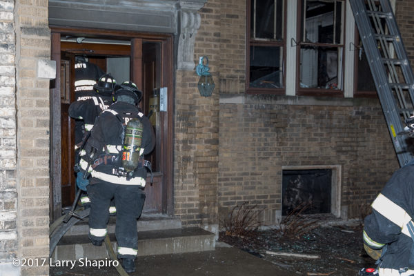 Firefighters enter building after fire