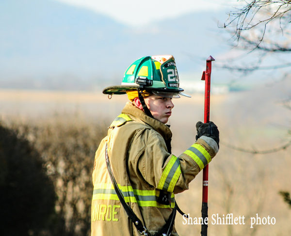 probationary firefighter at fire scene