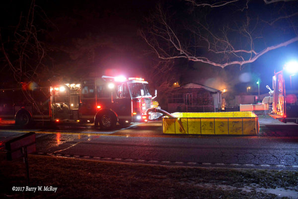 E-ONE fire engine drafts from portable tank at house fire