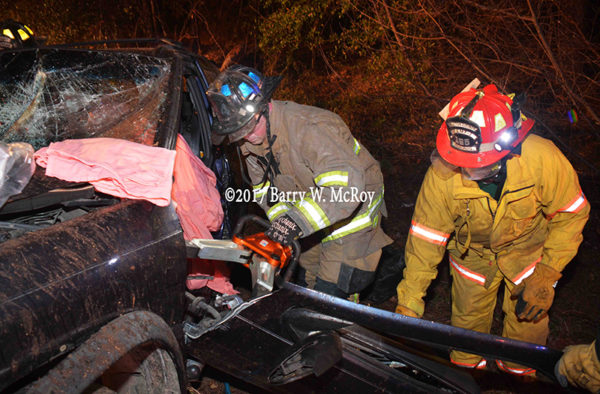 firefighters use Holmatro spreaders at vehicle extrication