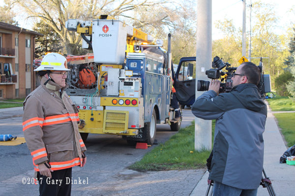 fire chief speaks to media at fire scene