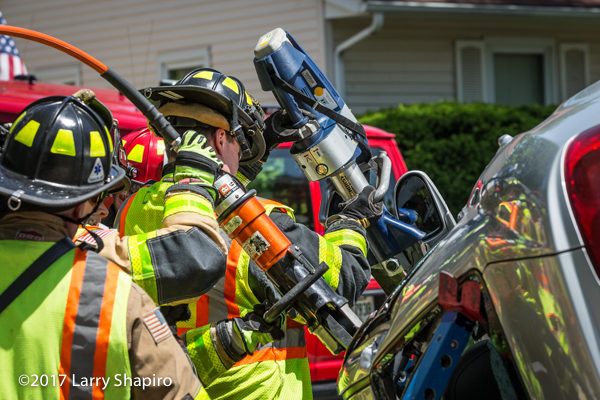 Firefighters free driver trapped in a car with Holmatro rescue tool