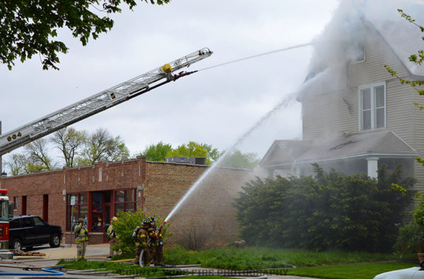 master streams directed at house fire