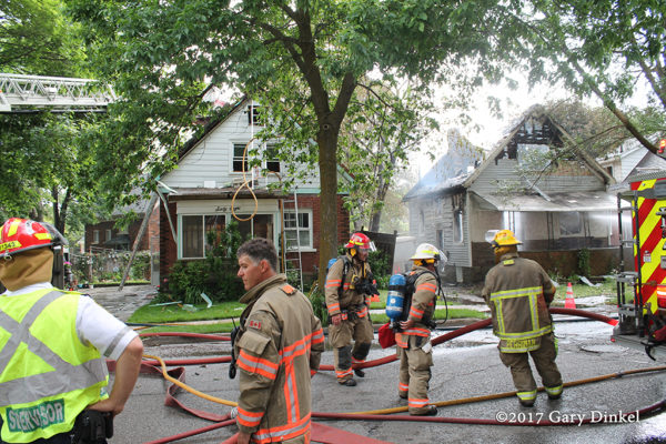 Kitchener firefighters at house fire scene
