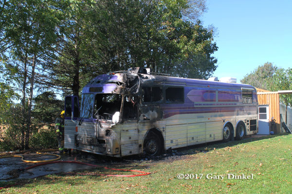 tour bus destroyed by fire