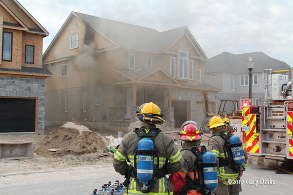 Kitchener firefighters battle house fire