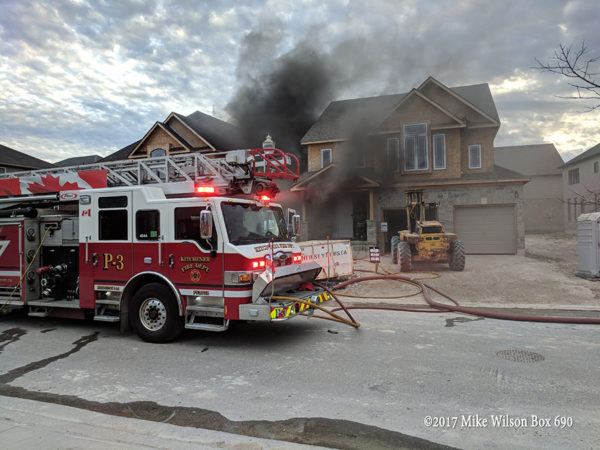 Kitchener firefighters battle house fire