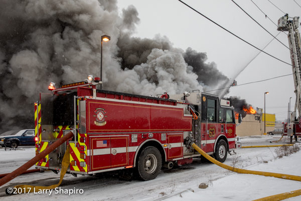 Pierce fire engine at massive building fire