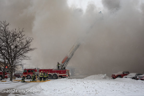 E-ONE tower ladder immersed in smoke 