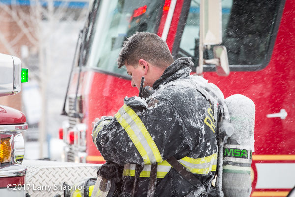 firefighter coated with ice