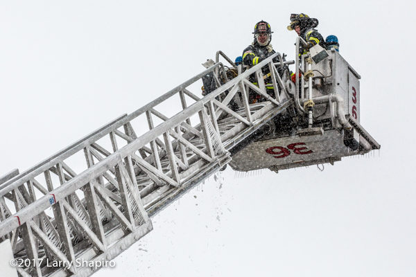 tower ladder coated with ice