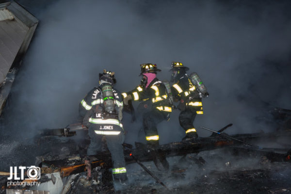 garage destroyed by fire at night