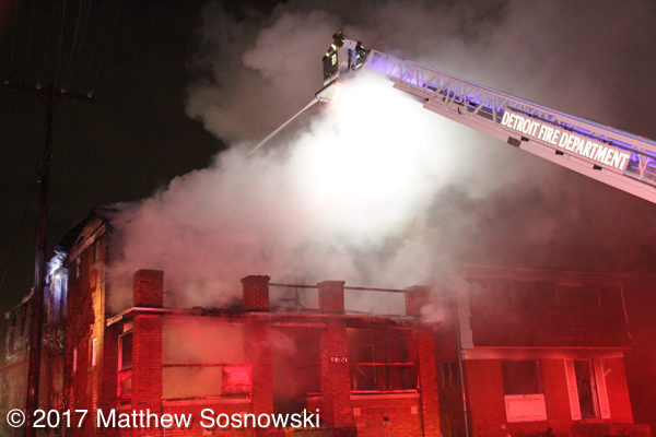 Detroit firefighters battle a house fire