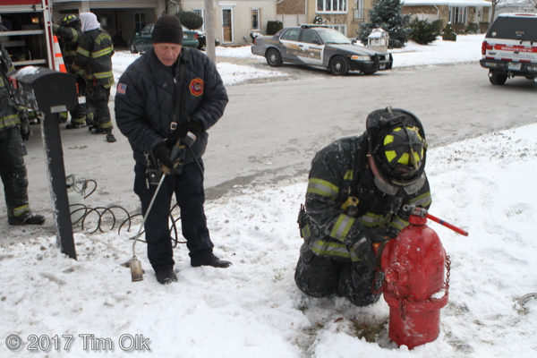 firefighters thaw frozen hydrant
