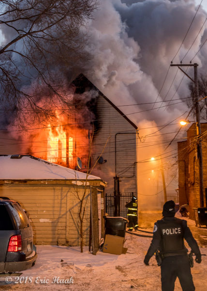 Chicago firefighters battle house fire and frigid weather