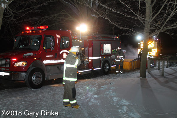 fire truck on scene at night in Canada