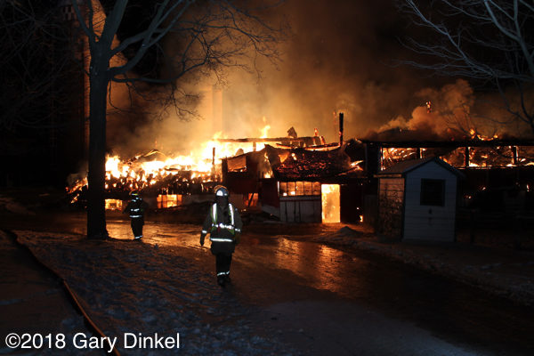 barn destroyed by fire at night