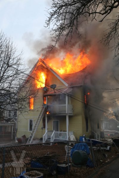3-story house engulfed in flames