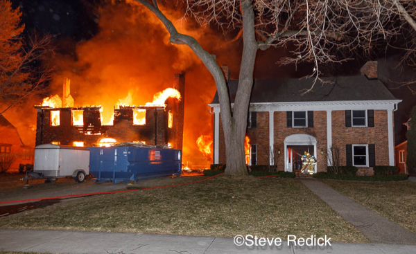 house under renovation engulfed by fire