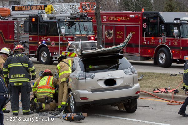 Firefighters free driver trapped in car
