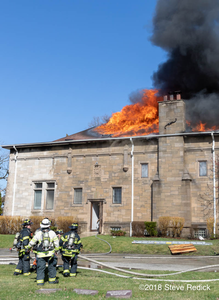 fire engulfs roof of a chapel
