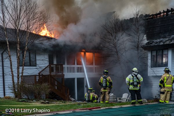 Firefighters battle huge house fire