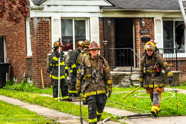 Detroit Firefighters after battling a dwelling fire
