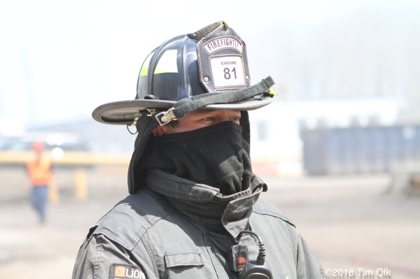 firefighter with Nomex hood to block smoke
