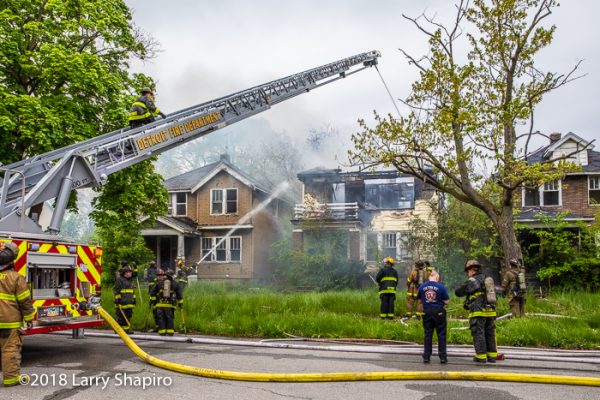 Smeal aerial ladder at work during Detroit house fire