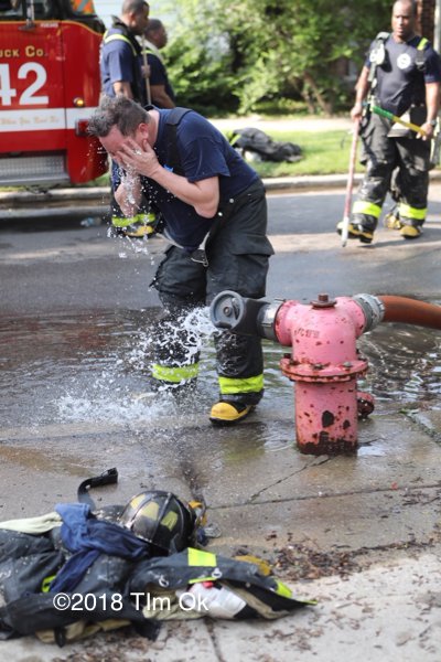 Firefighter cooling off on a hot day