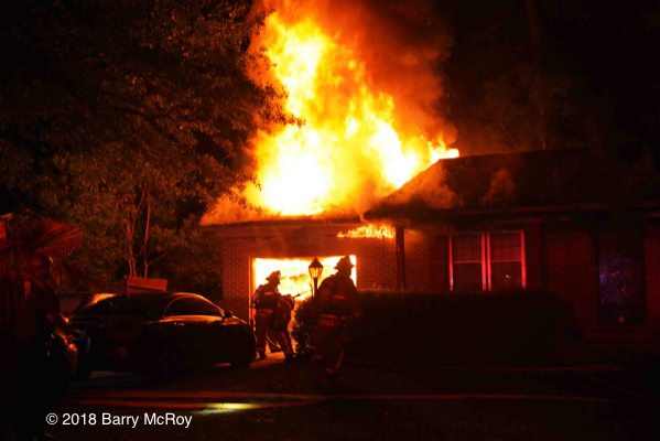 Colleton County firefighters battle a house fire at night