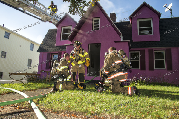 Firefighters in West Have CT at the scene of a fire in a house