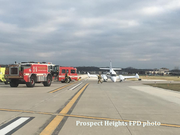 Prospect Heights FPD apparatus at airport standby. after Cessna lands with unlocked front gear