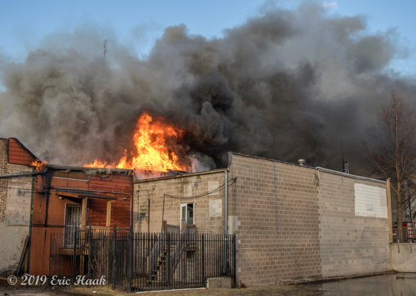 massive smoke and flames from commercial building fire in Chicago