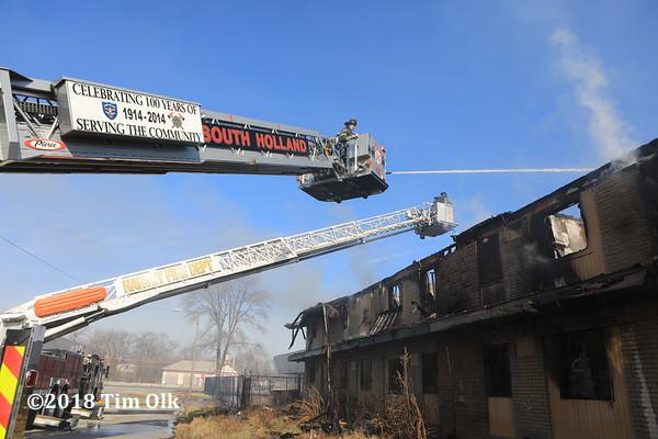 South Holland FD tower ladder at work