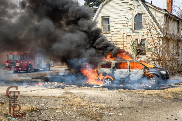 minivan engulfed in fire
