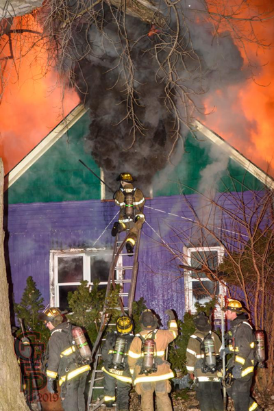 heavy smoke from attic during house fire