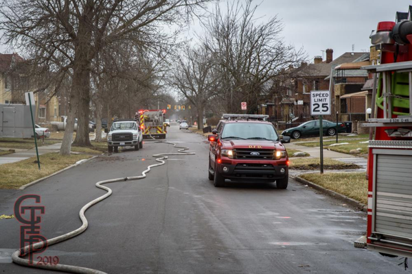 hose in street at Detroit fire scene