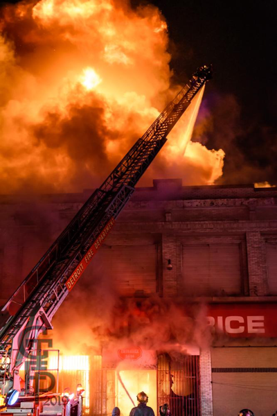 Detroit Firefighters battle a 2-Alarm commercial building fire at night