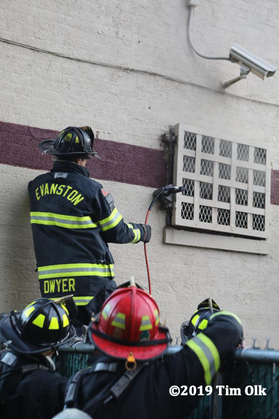 Firefighters vent commercial building fire